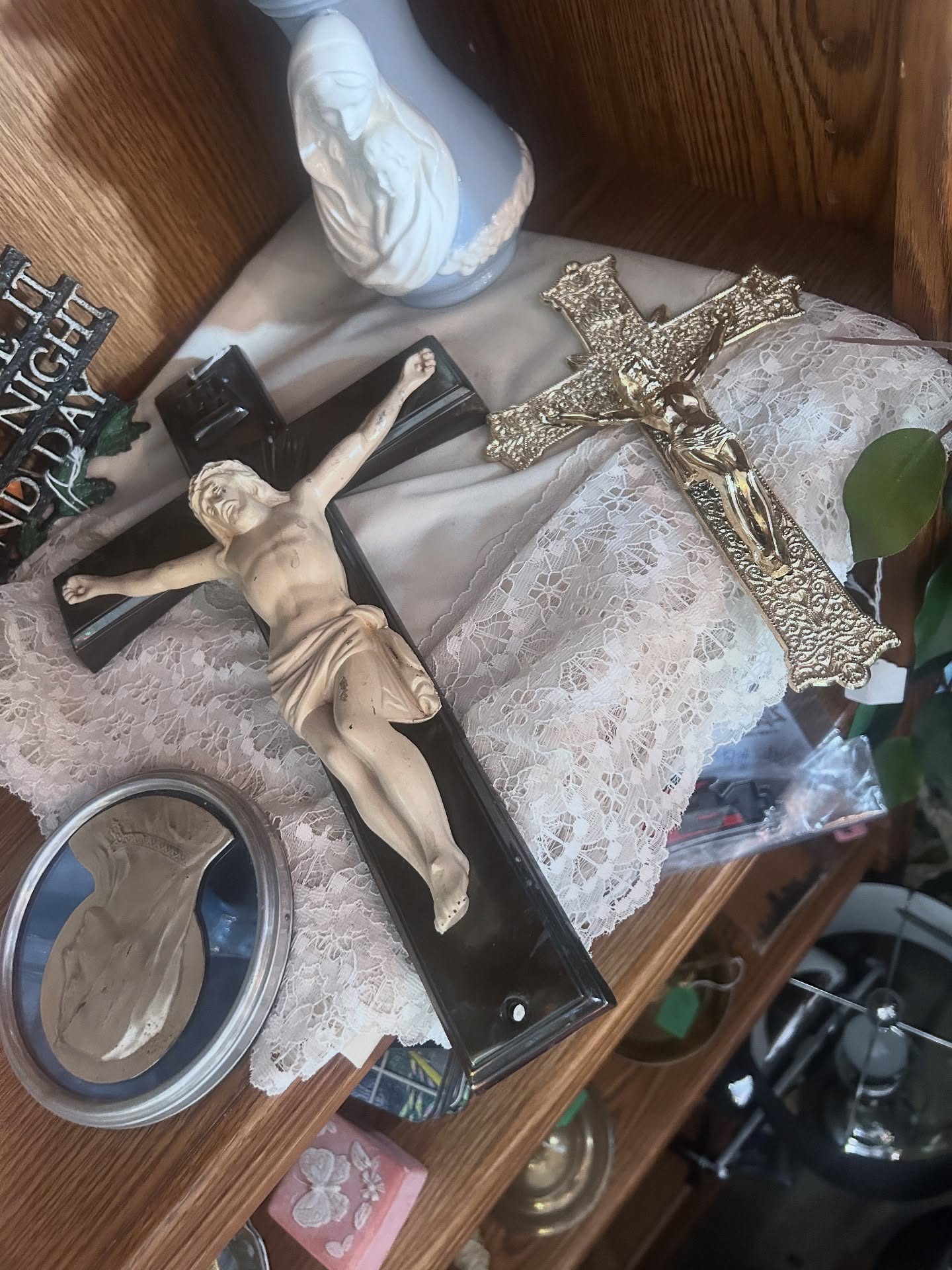 Religious crucifix collection on lace
