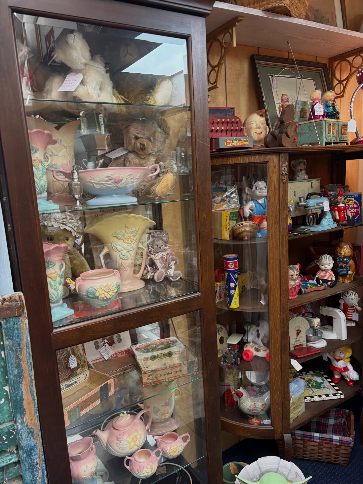Antique display cabinet with toys