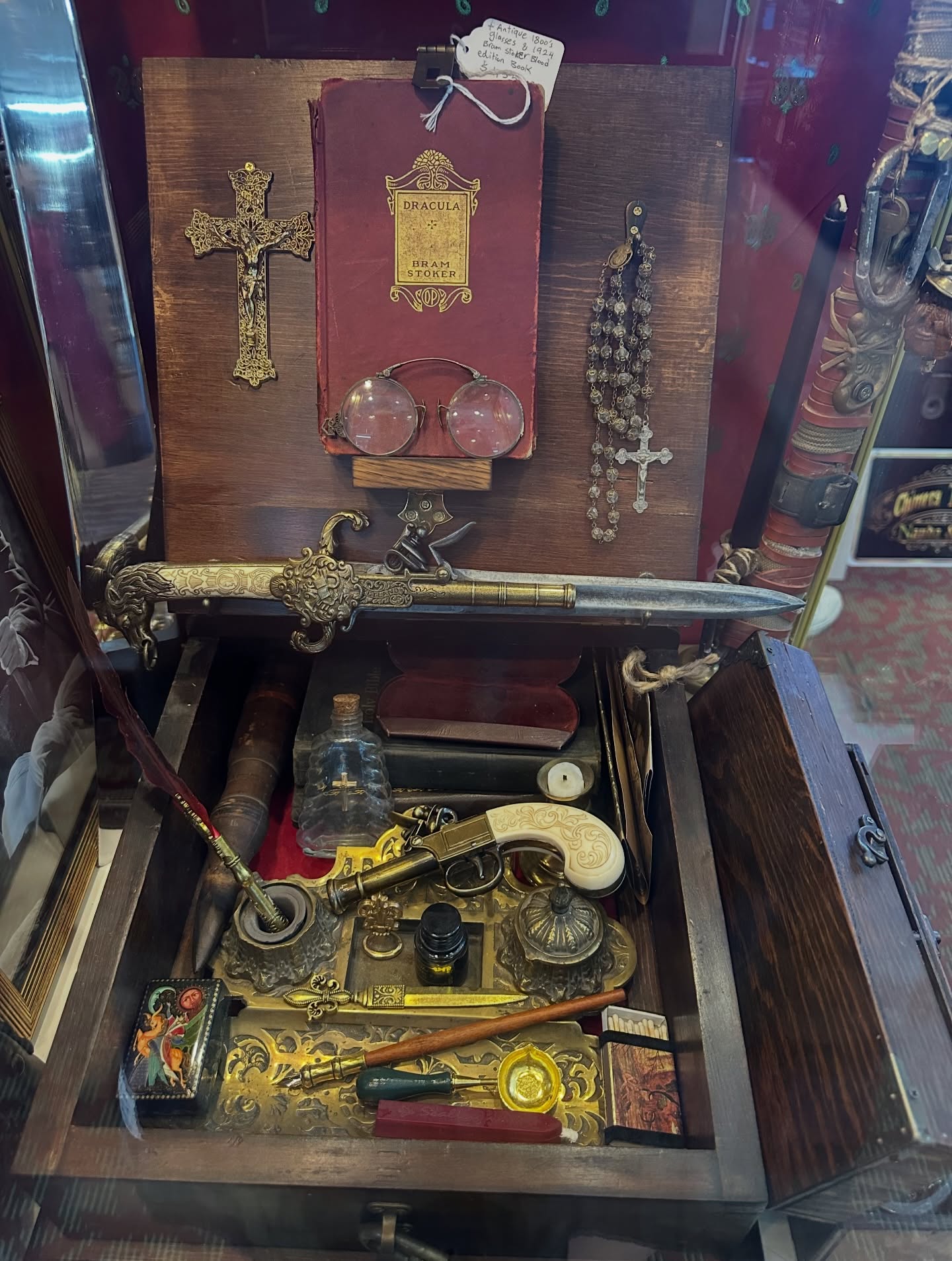Antique display case with vintage curiosities